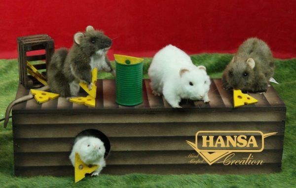 Display with 4 mice: two brown mice and one white mouse on the top of the wooden log box with a second white mouse peeking out from a hole in the box. Swiss cheese pieces are dotted around